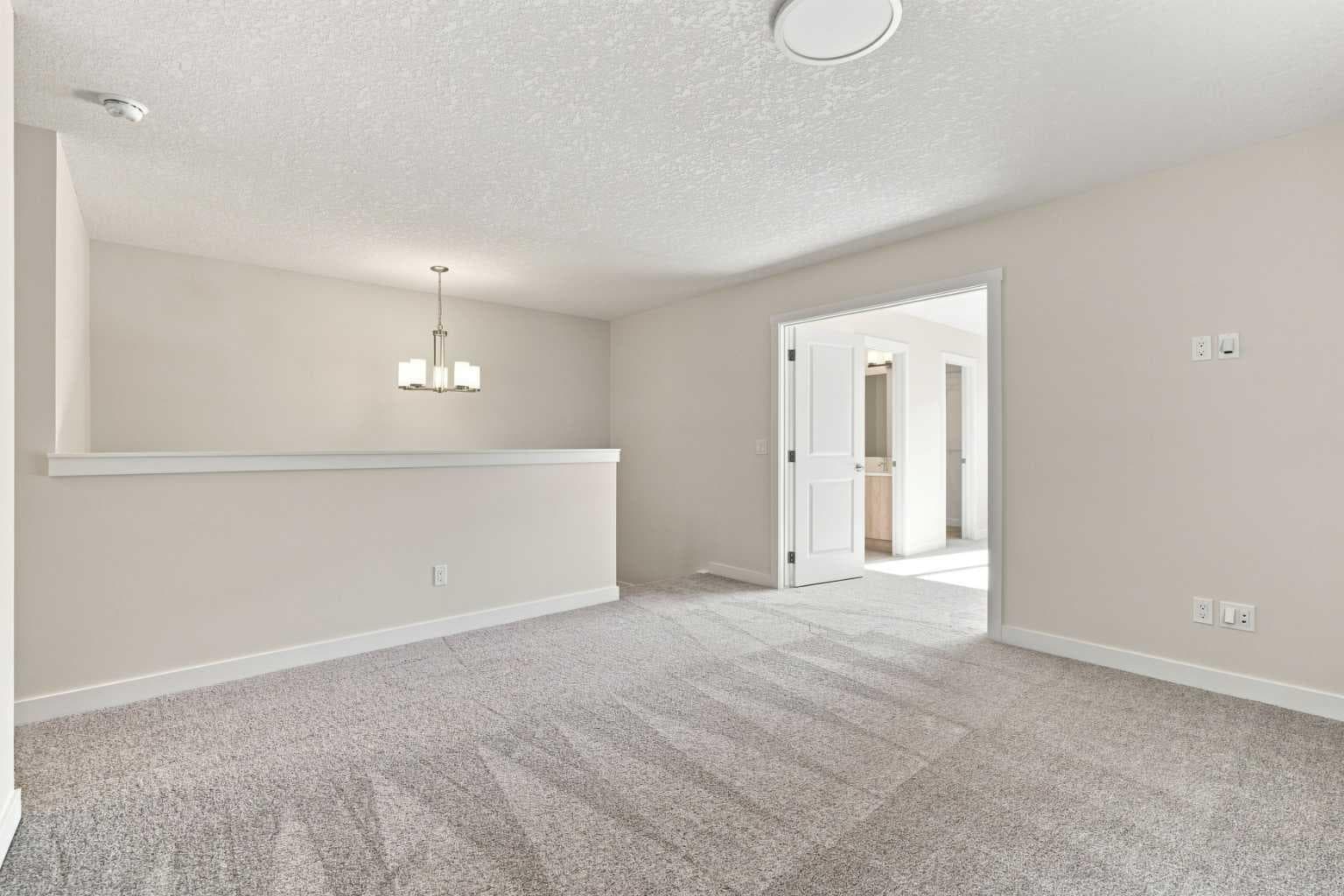 76 Buffaloberry Manor SE