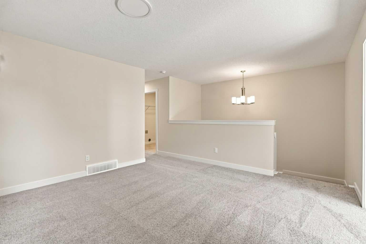 76 Buffaloberry Manor SE