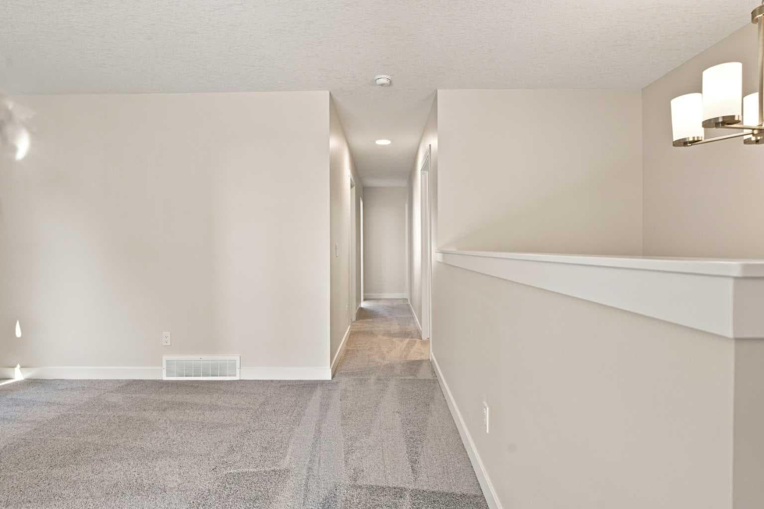 76 Buffaloberry Manor SE