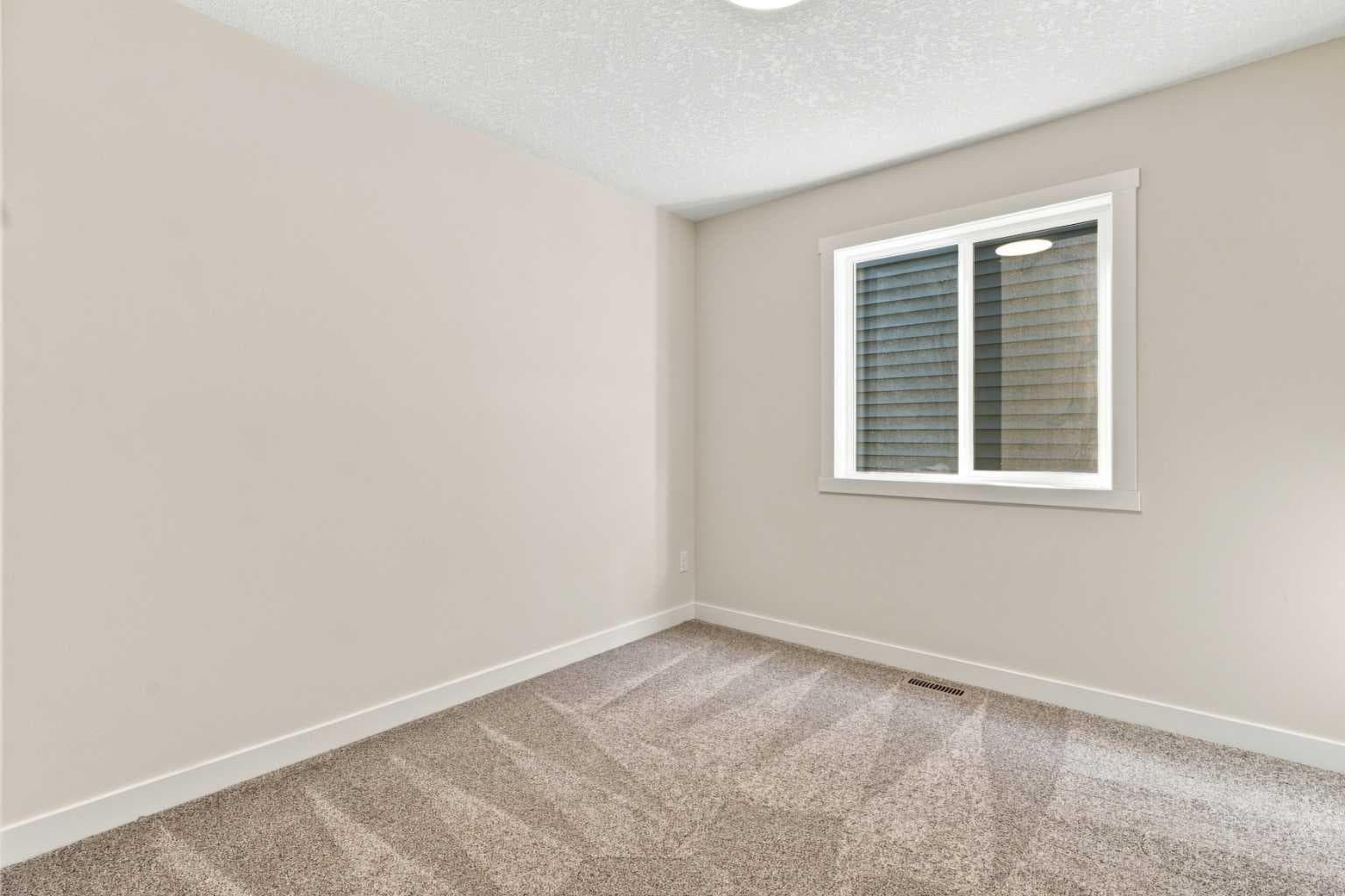 76 Buffaloberry Manor SE