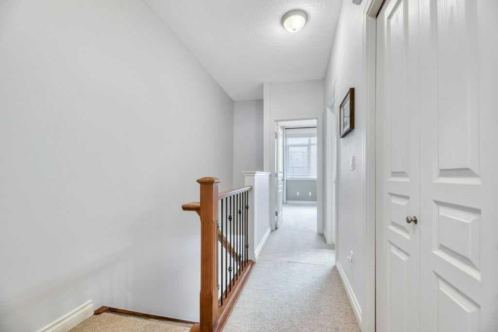 13, 148 Rockyledge View NW