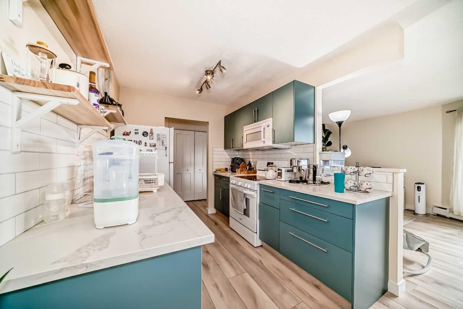 202, 520 Cedar Crescent SW