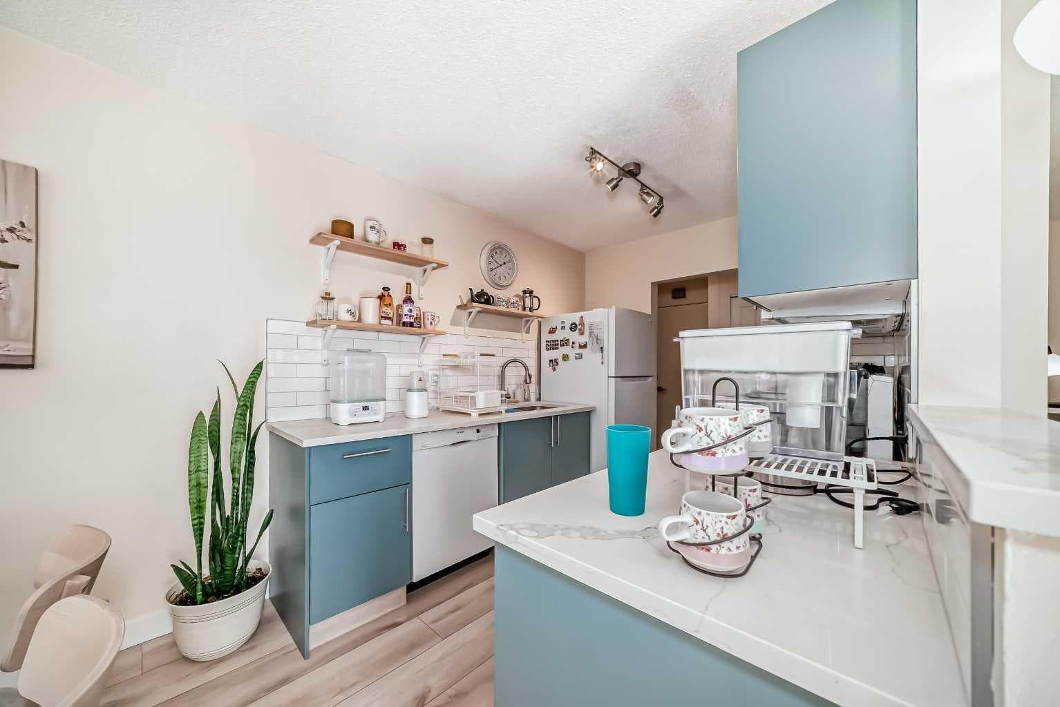 202, 520 Cedar Crescent SW