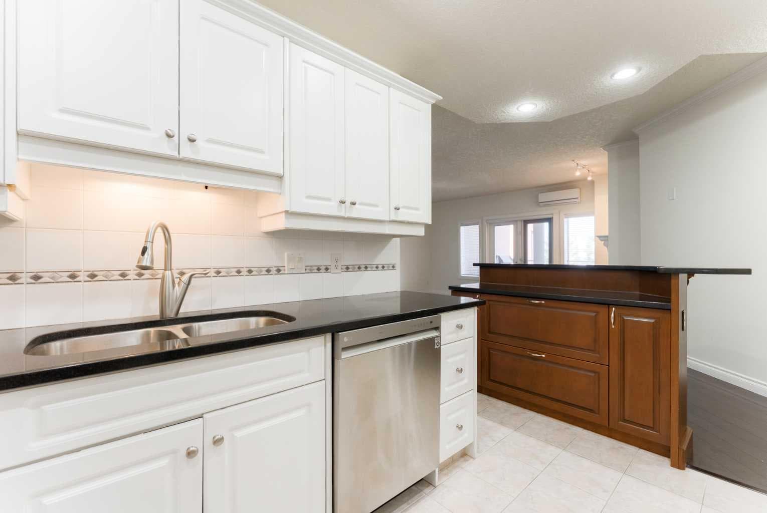 205, 200 Patina Court SW