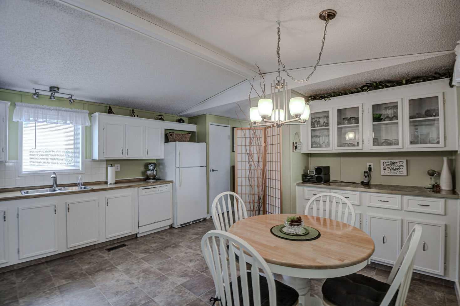 221, 99 Arbour Lake Road NW