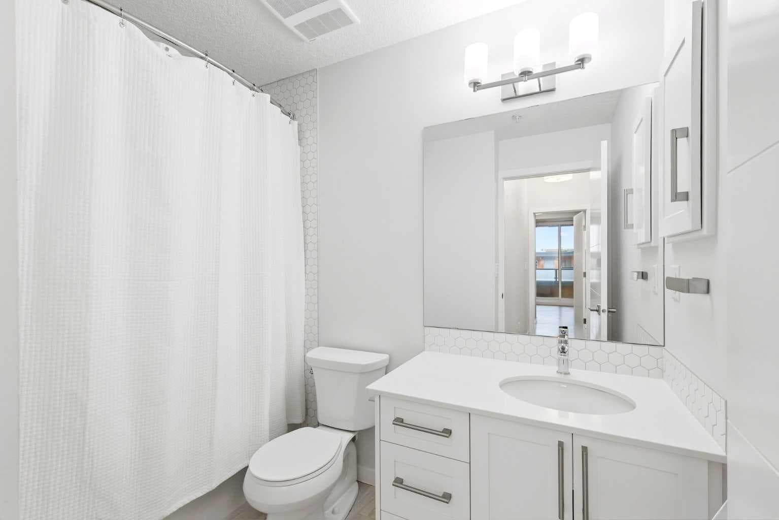 212, 122 Mahogany Centre SE