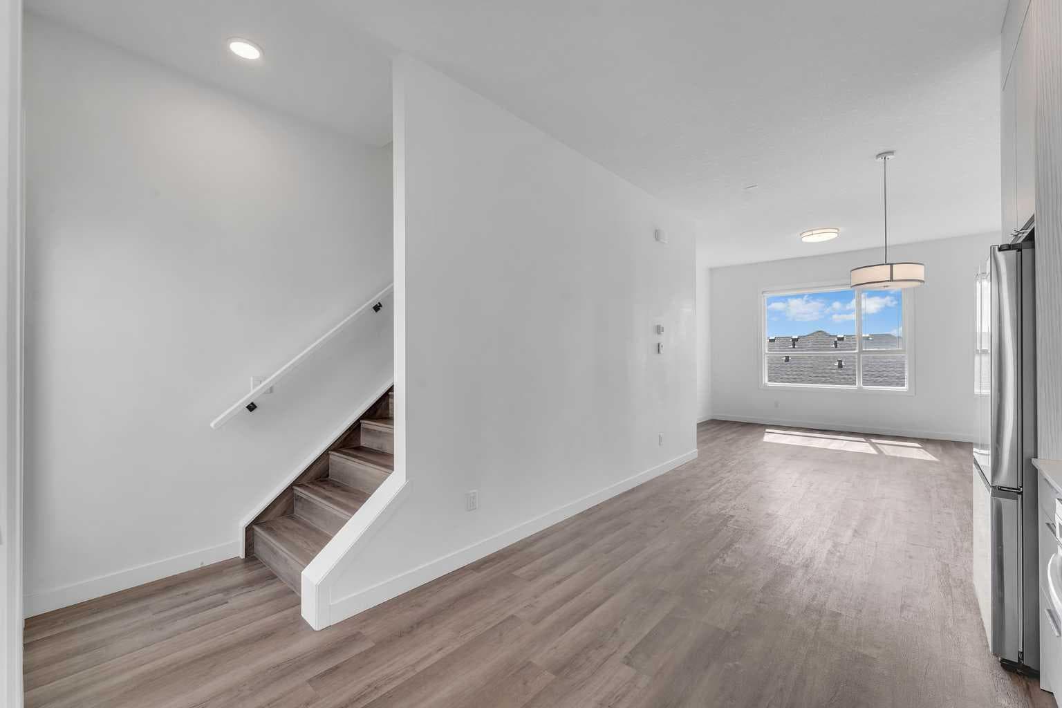 208, 101 Panatella Square NW