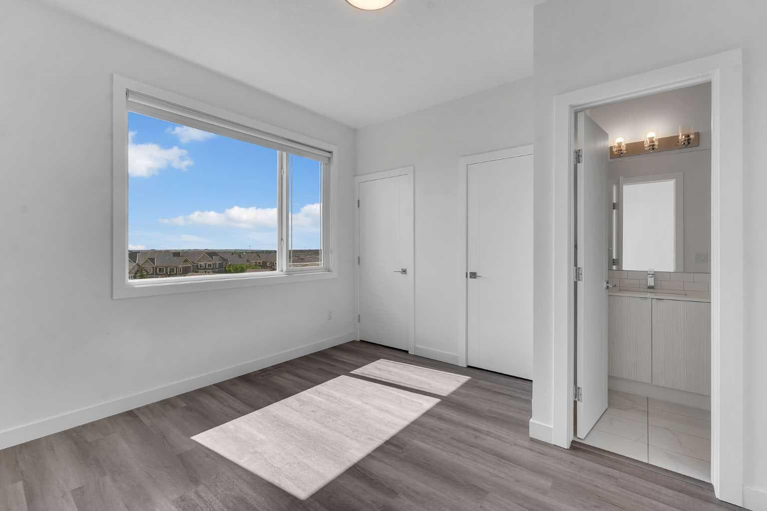 208, 101 Panatella Square NW