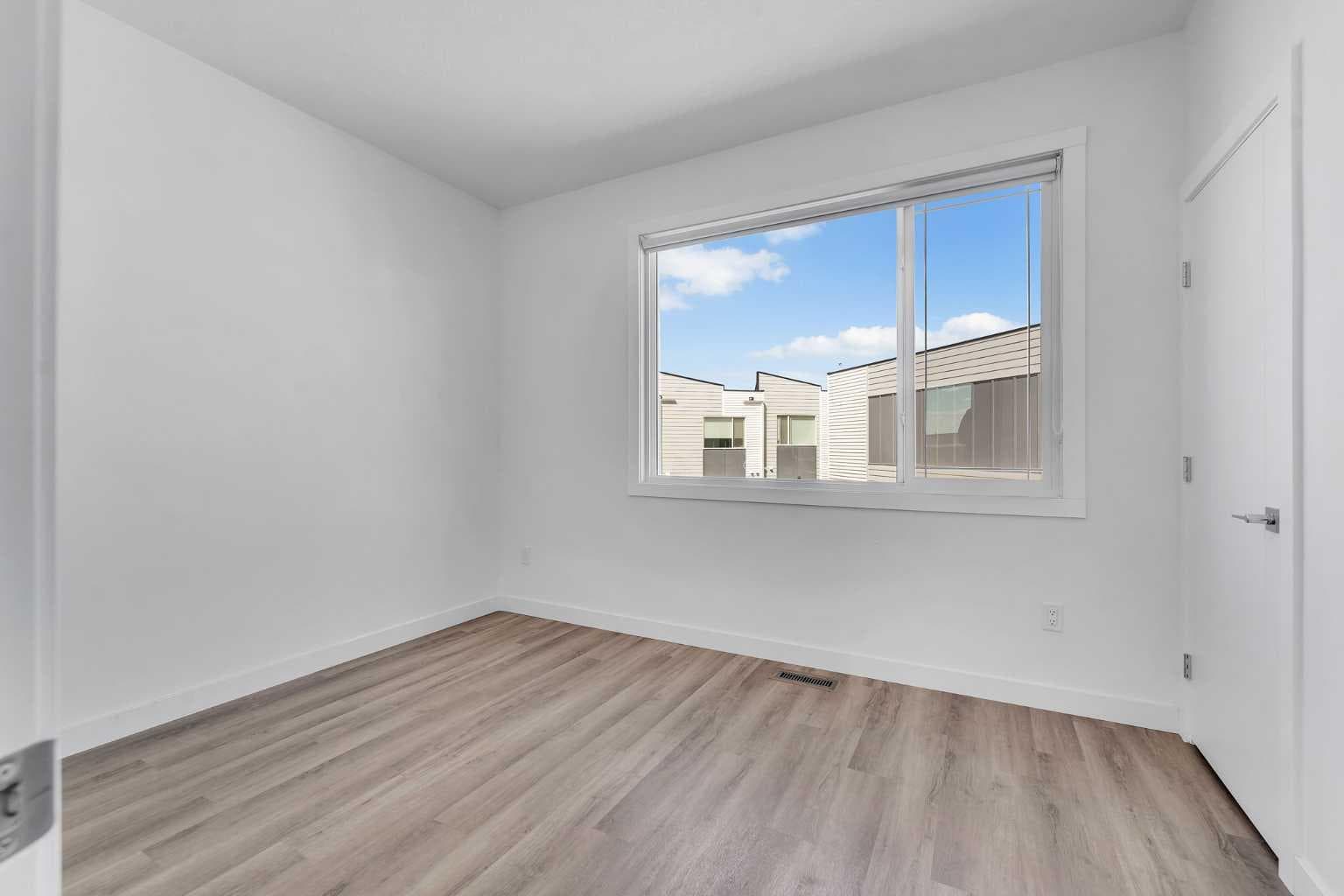 208, 101 Panatella Square NW