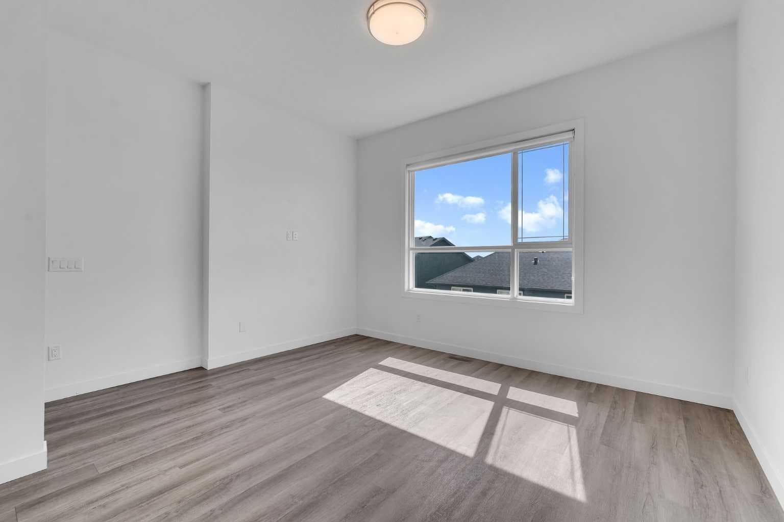 208, 101 Panatella Square NW