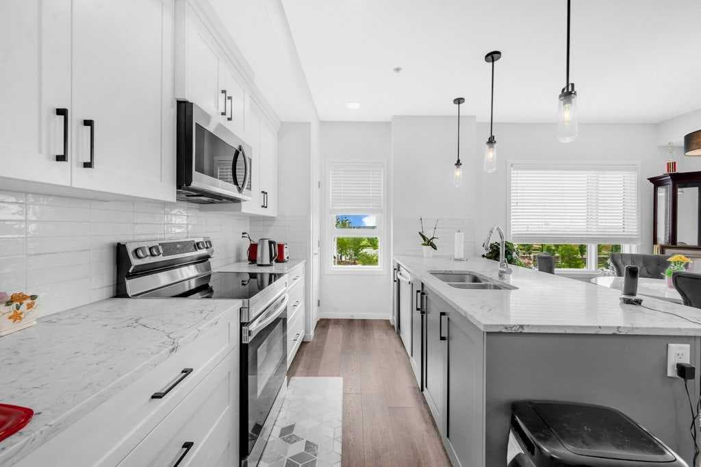 1211, 19489 Main Street SE