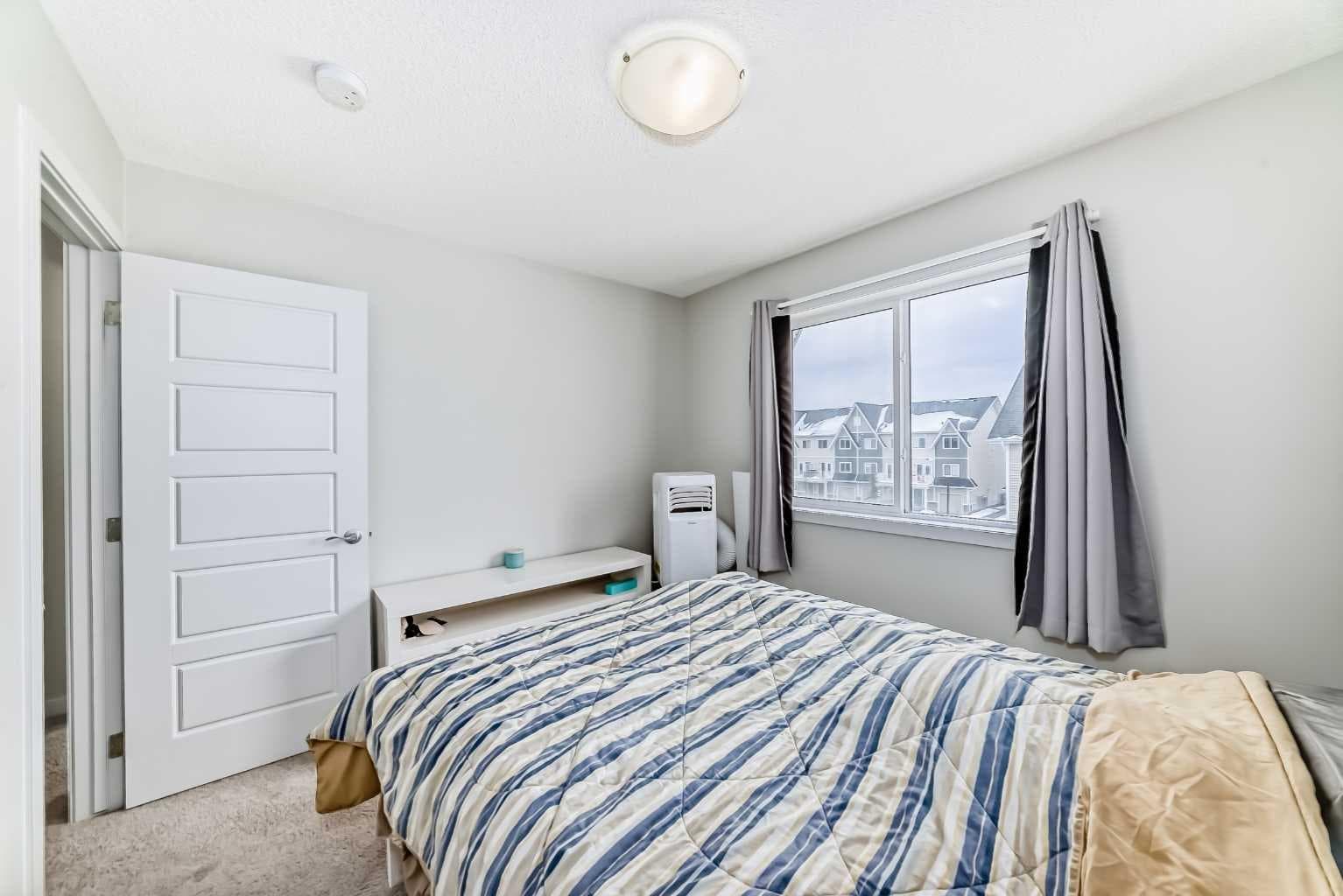 806, 32 Red Embers Parade NE