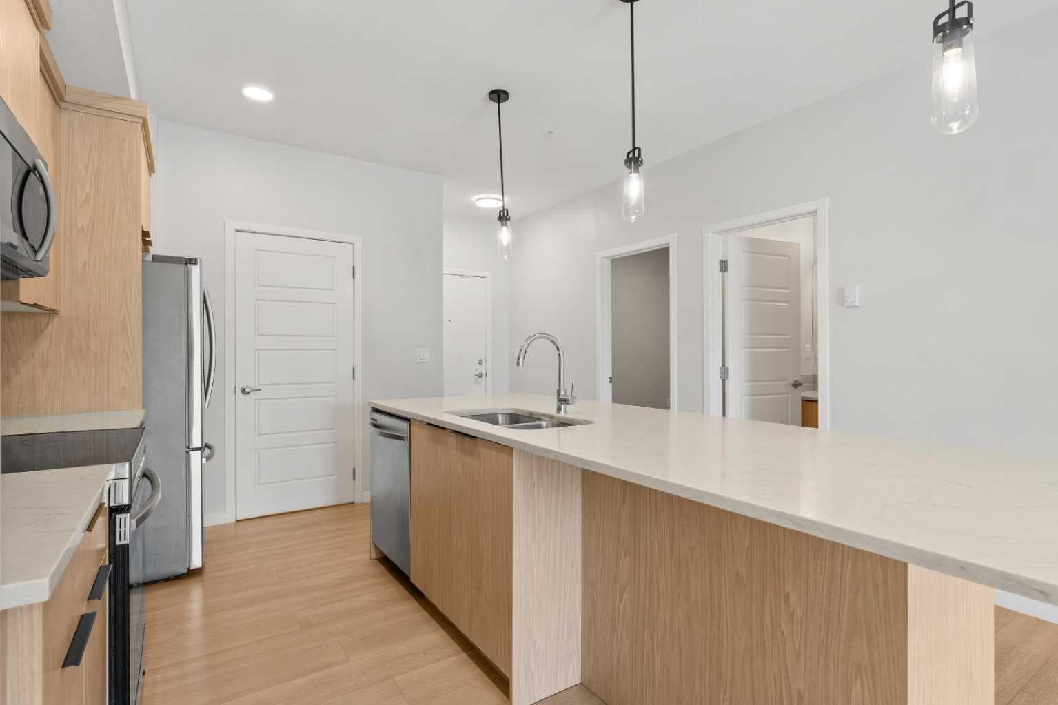 2203, 19489 Main Street SE