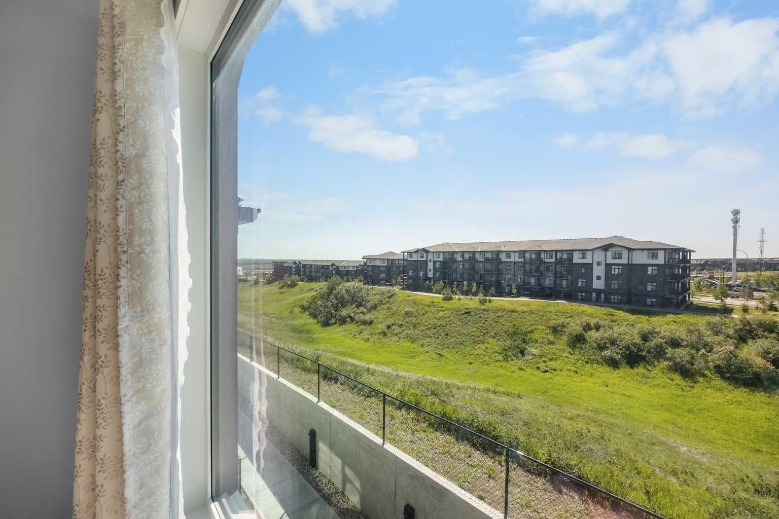 313, 85 Sage Hill Heights NW