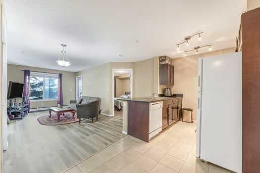 215, 355 Taralake Way NE