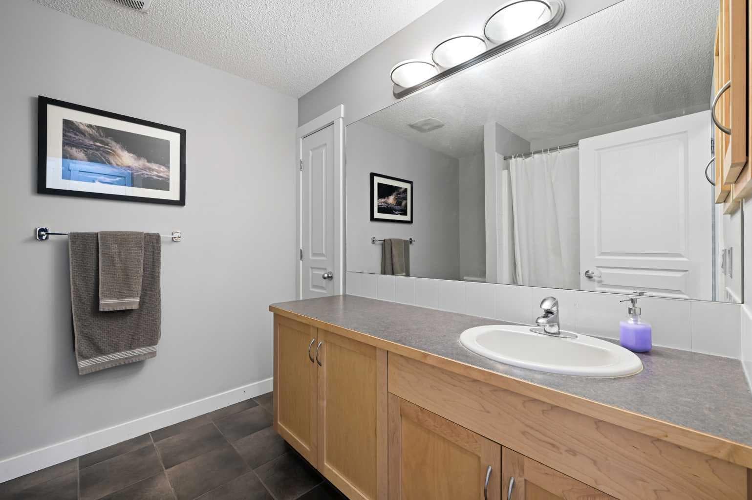2205, 211 Aspen Stone Boulevard SW