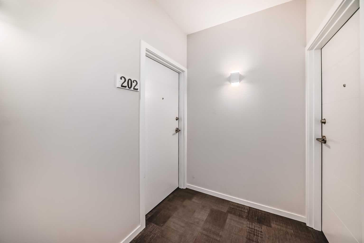 202, 245 Redstone Walk NE