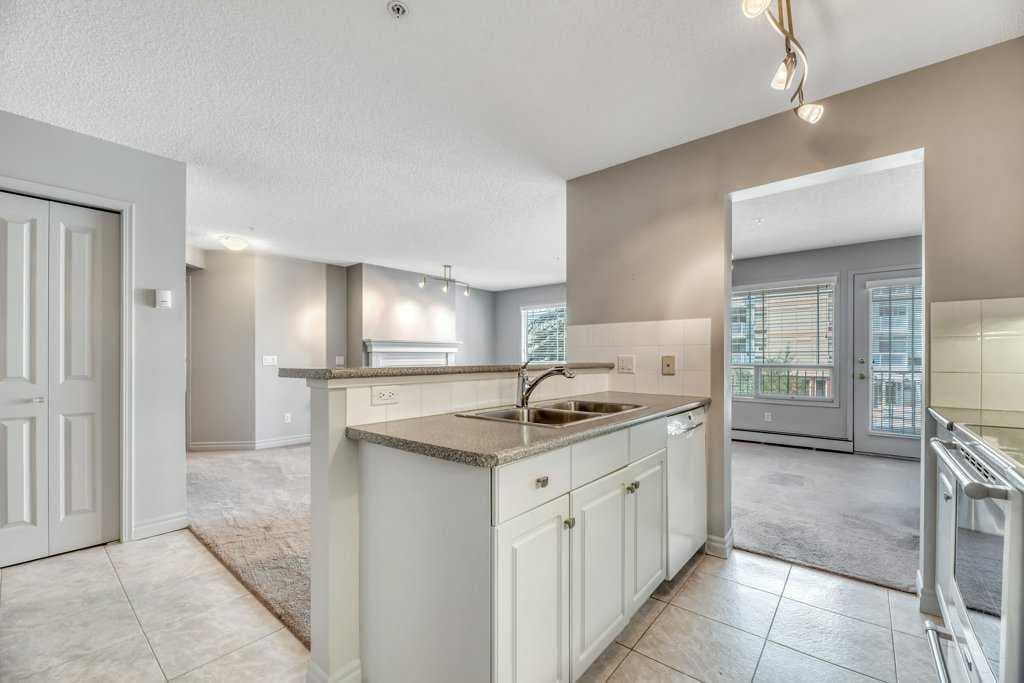 211, 2144 Paliswood Road SW