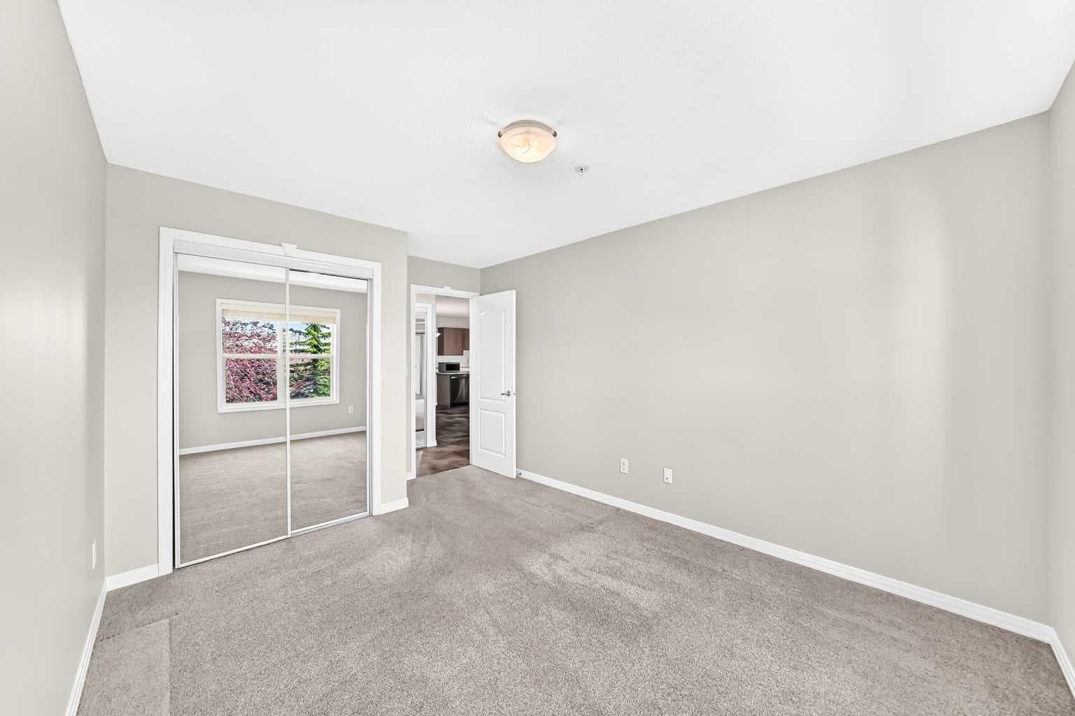 2215, 303 Arbour Crest Drive NW