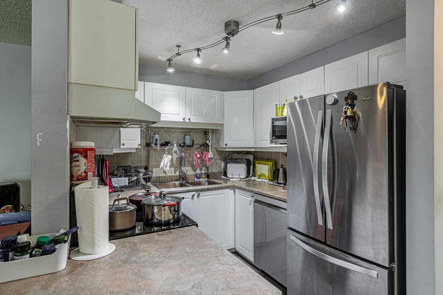 407, 9 Country Village Bay NE