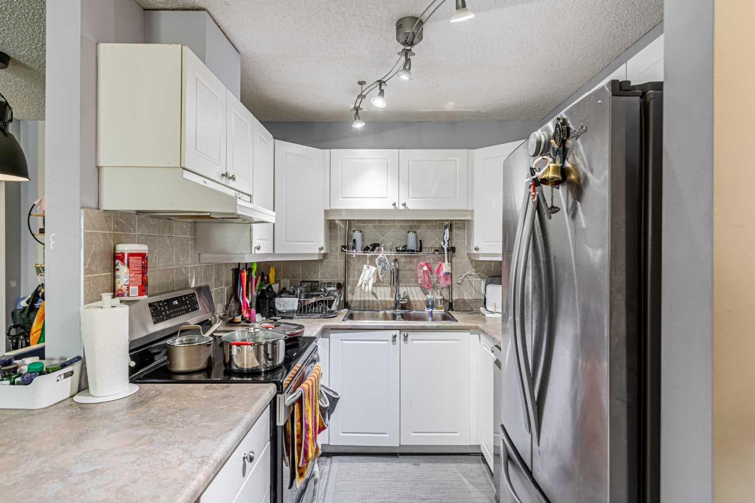 407, 9 Country Village Bay NE