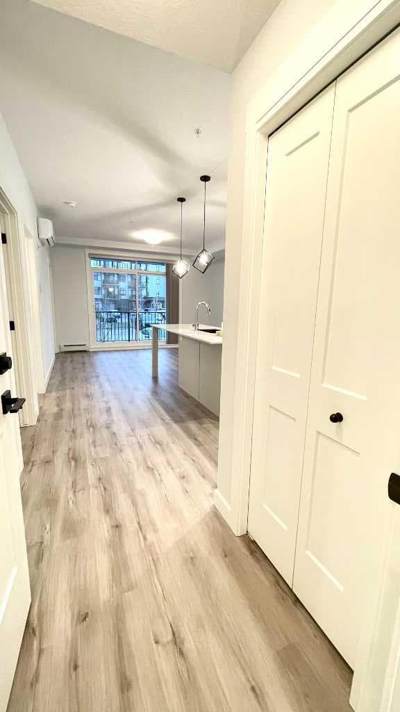 115, 40 Sage Hill  NW