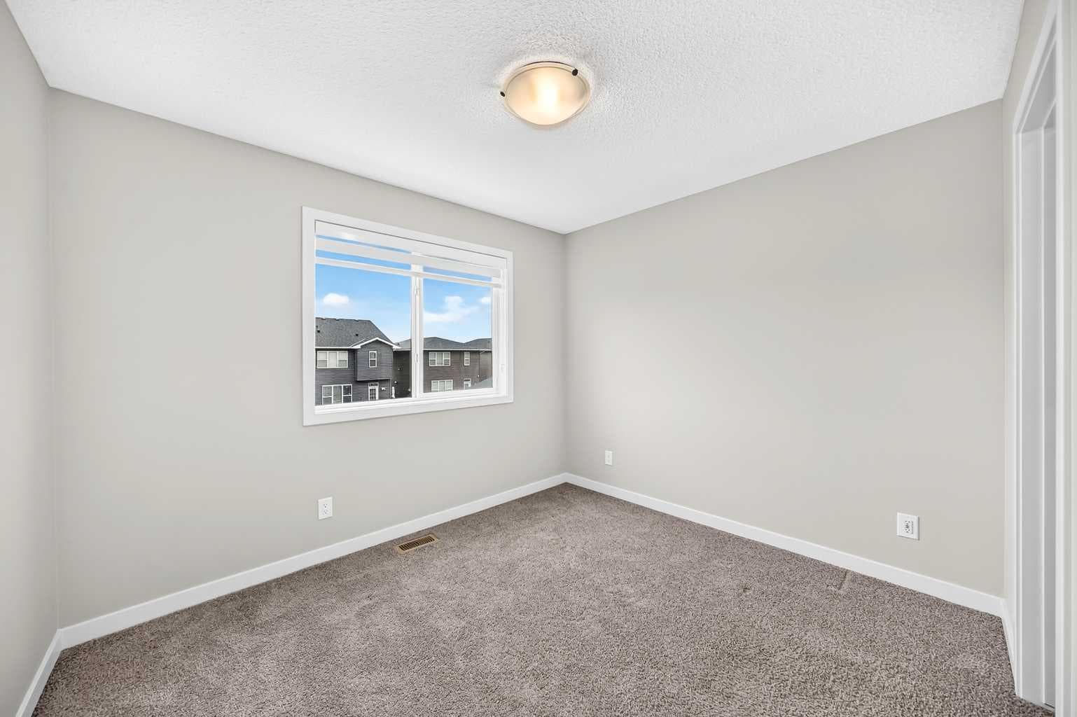 716, 32 Red Embers Parade NE