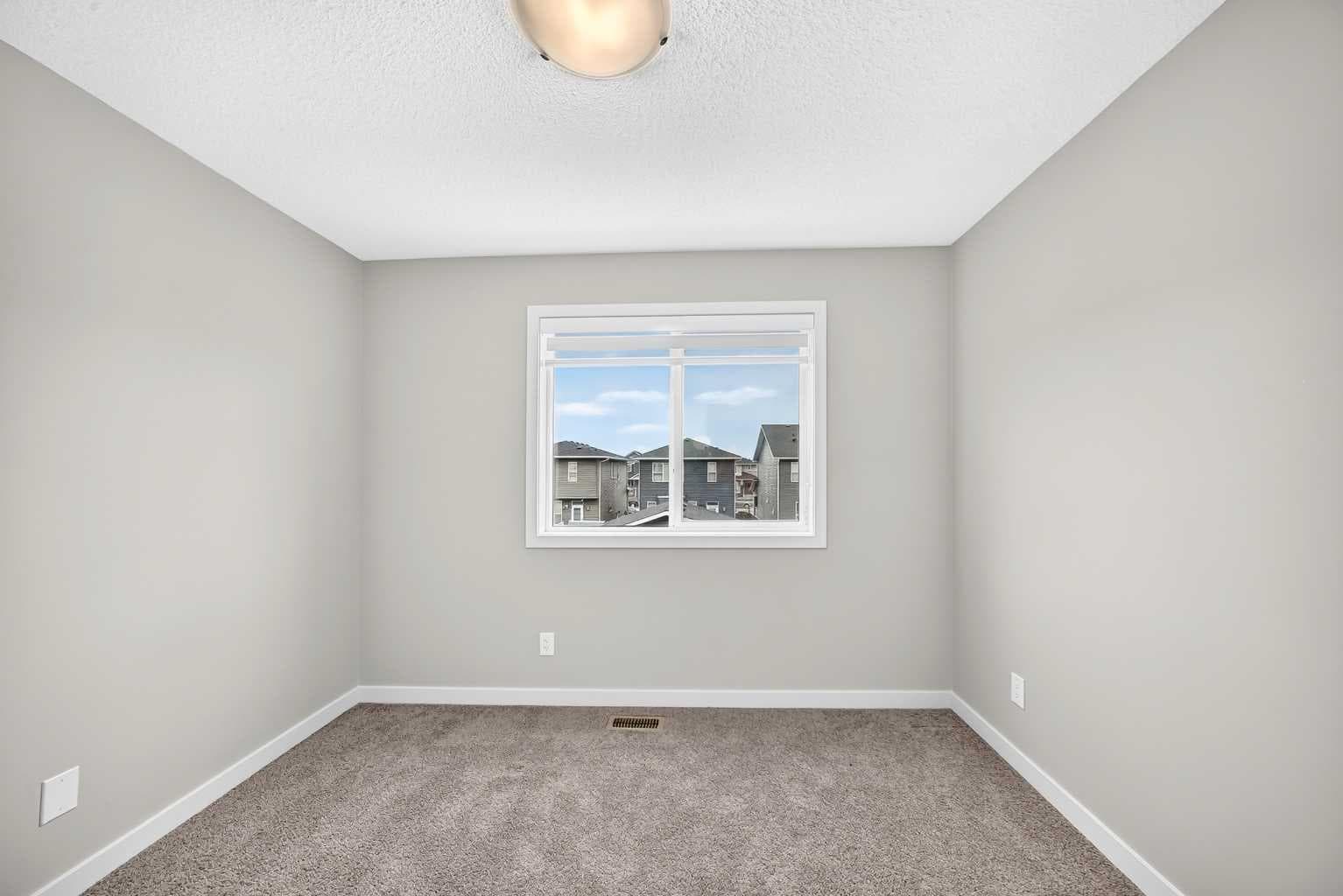716, 32 Red Embers Parade NE