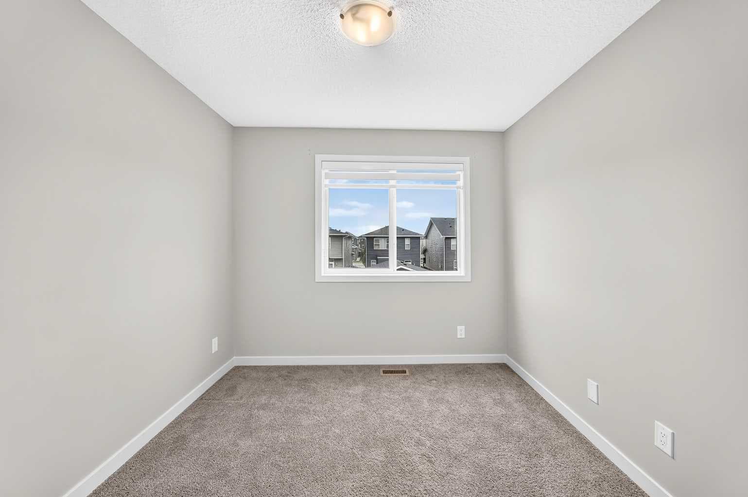 716, 32 Red Embers Parade NE
