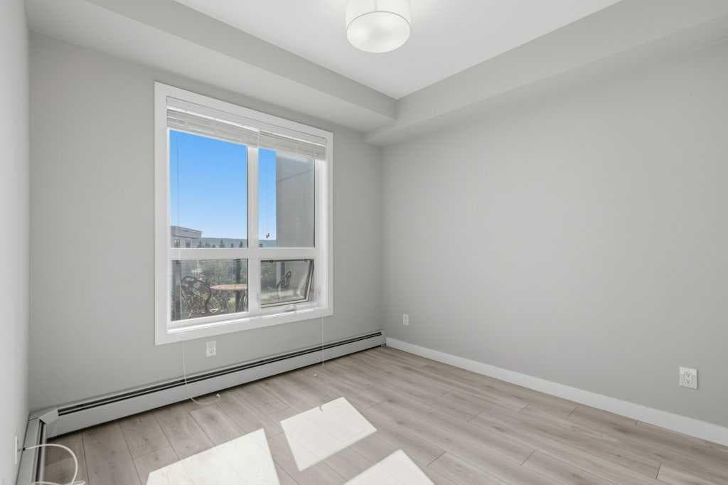 402, 383 Smith Street NW