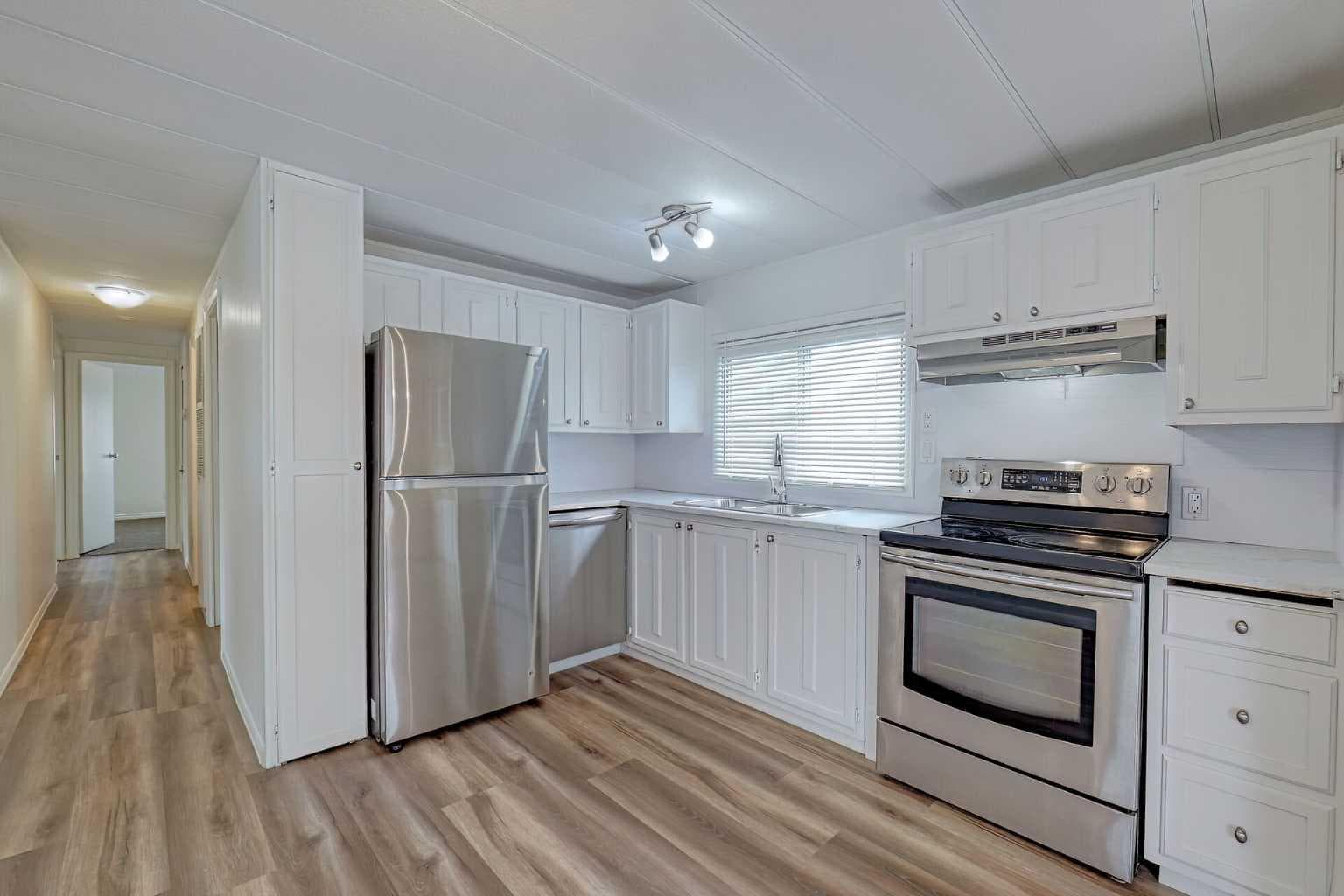 303, 99 Arbour Lake Road NW