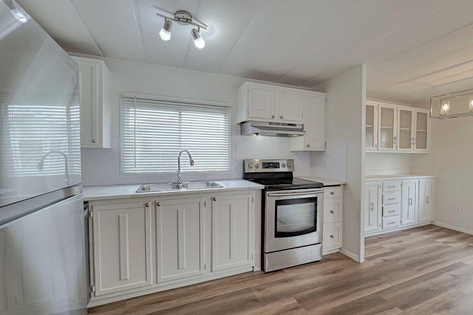 303, 99 Arbour Lake Road NW