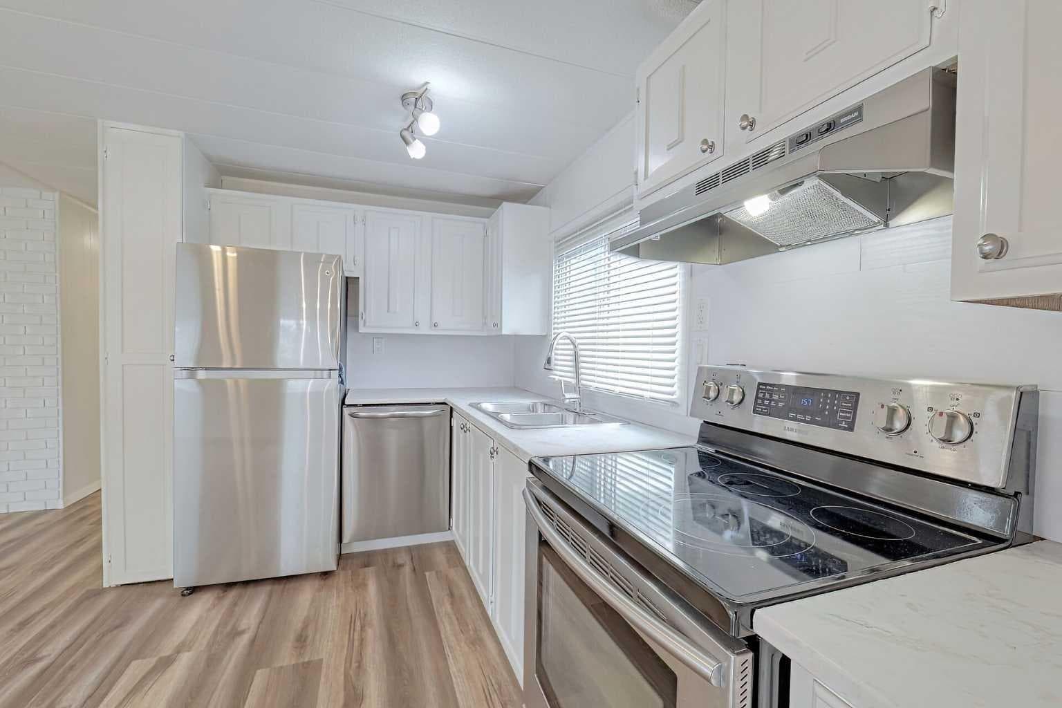 303, 99 Arbour Lake Road NW