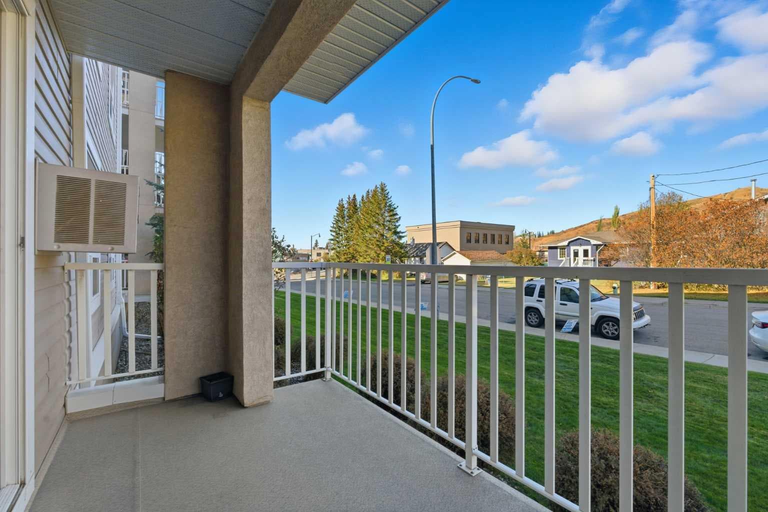 103, 128 Centre Avenue 