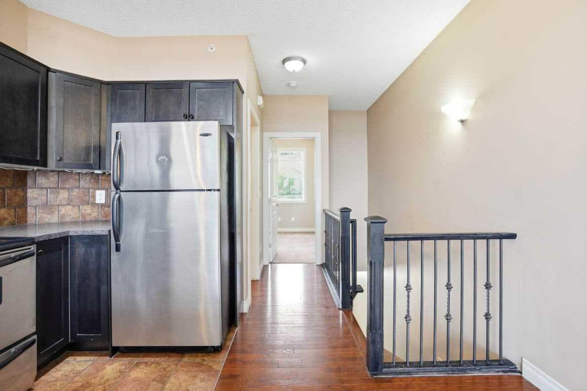 11, 148 Rockyledge View NW