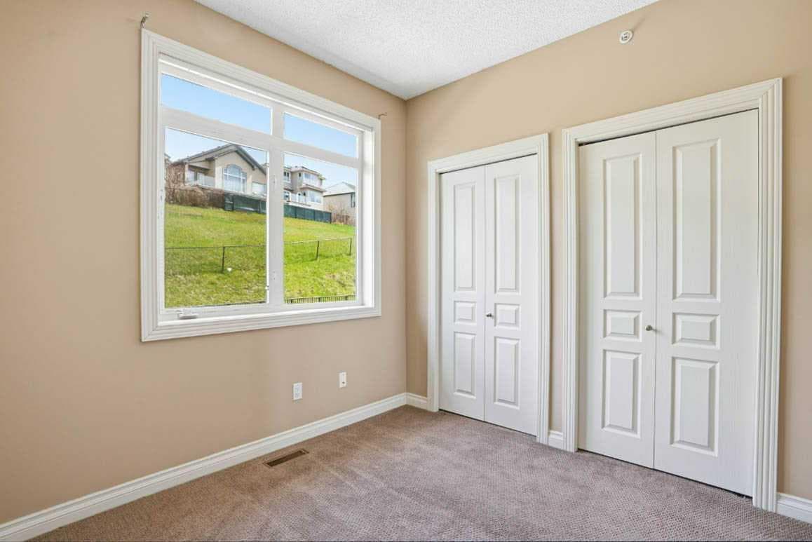 11, 148 Rockyledge View NW