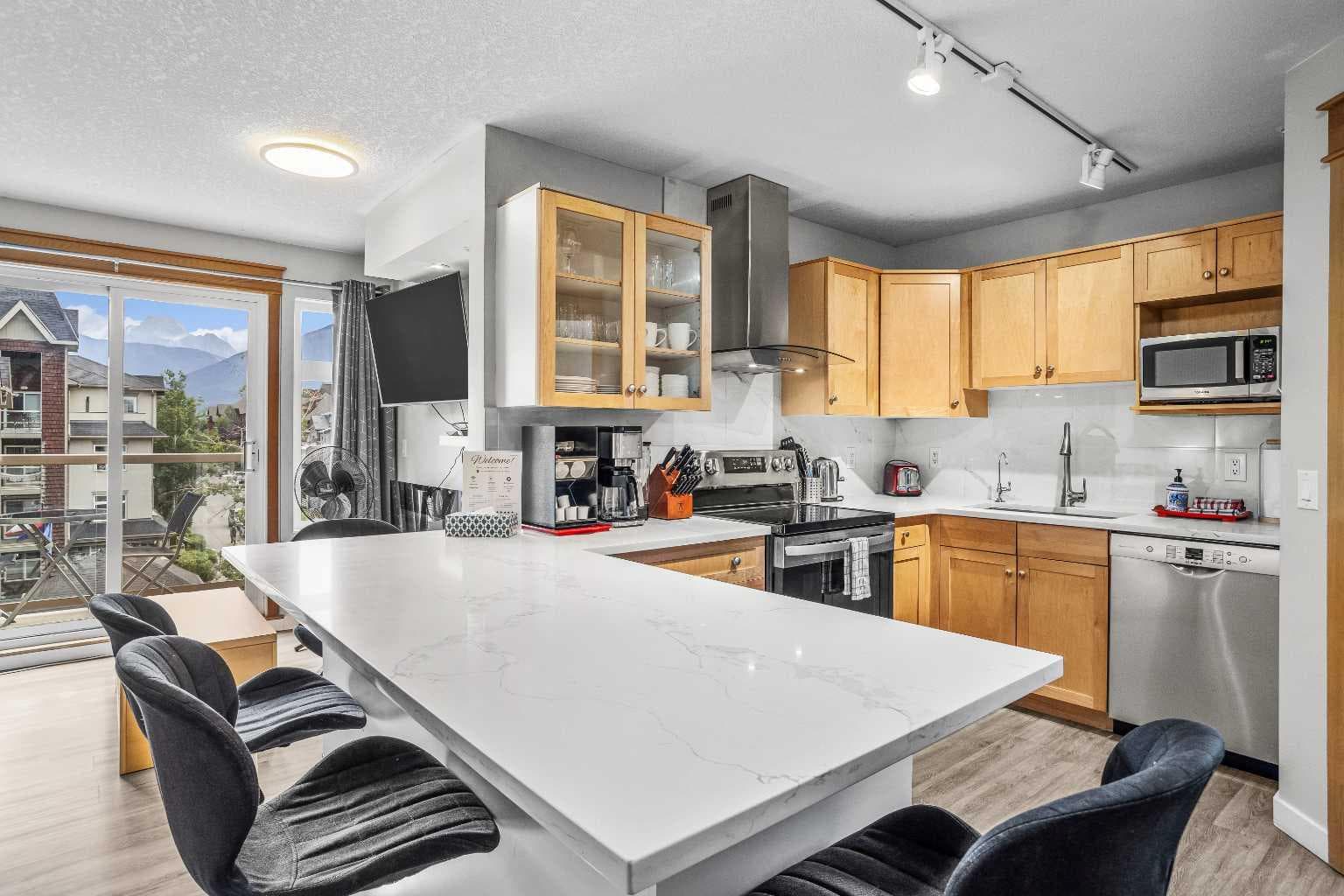 401, 160 Kananaskis Way 