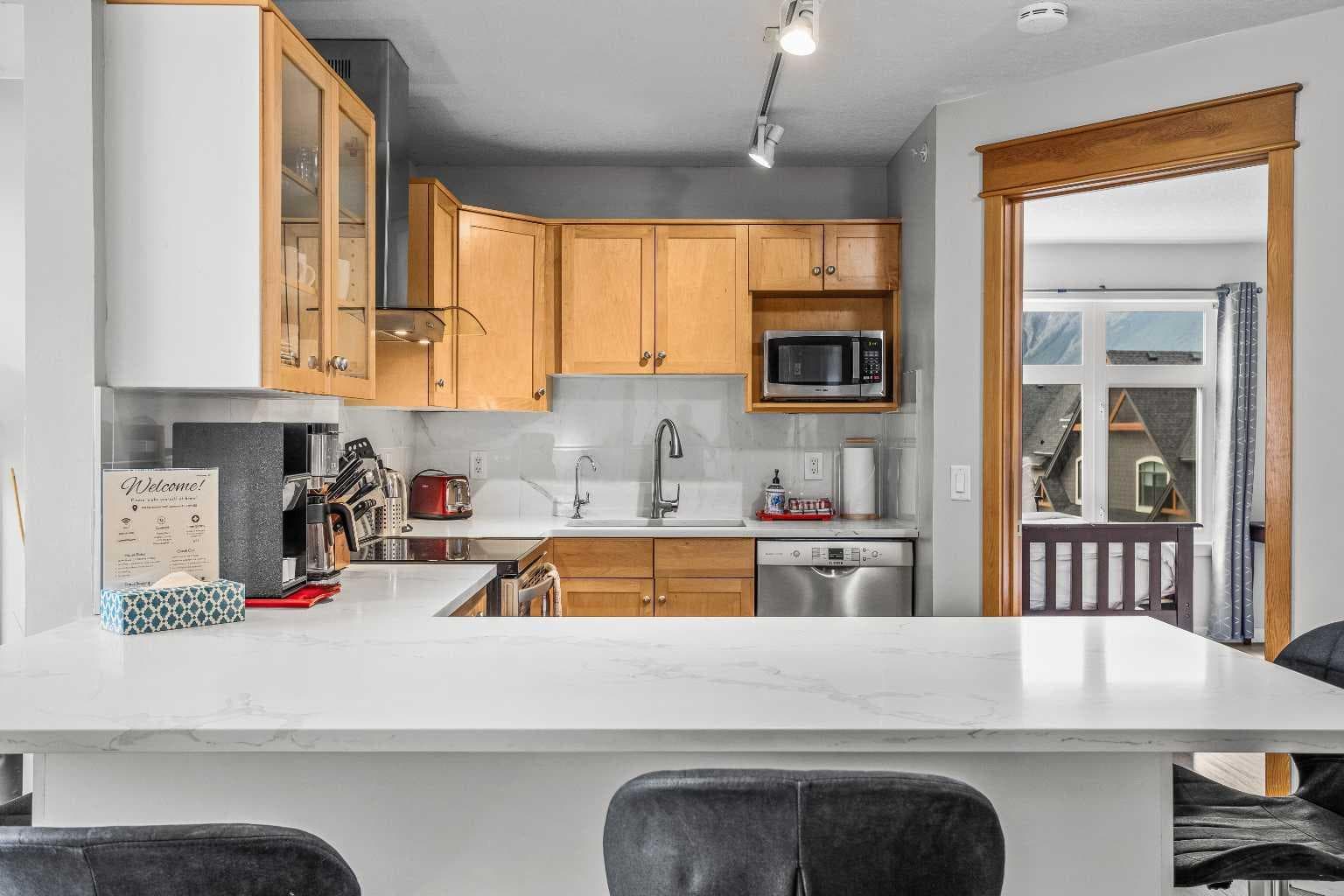 401, 160 Kananaskis Way 