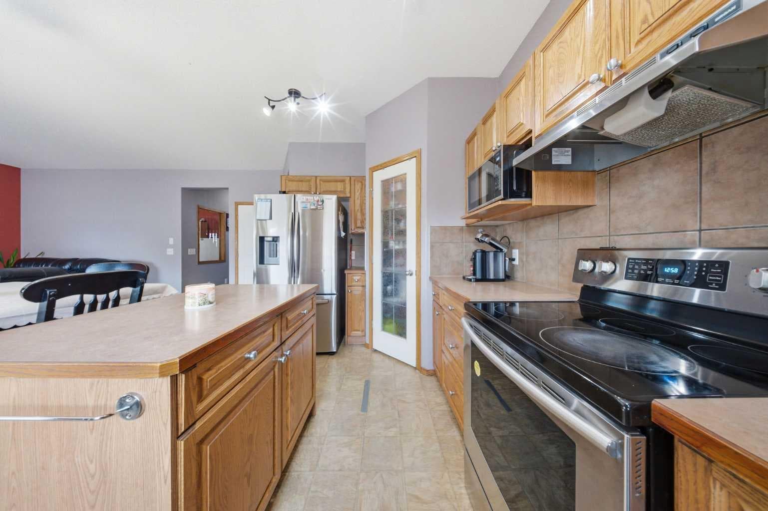 154 Saddleland Close NE