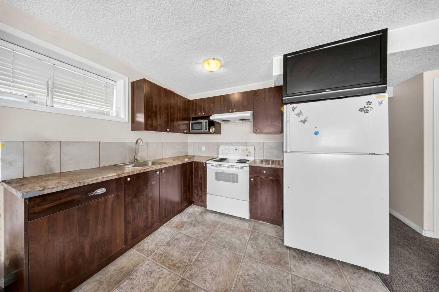 154 Saddleland Close NE