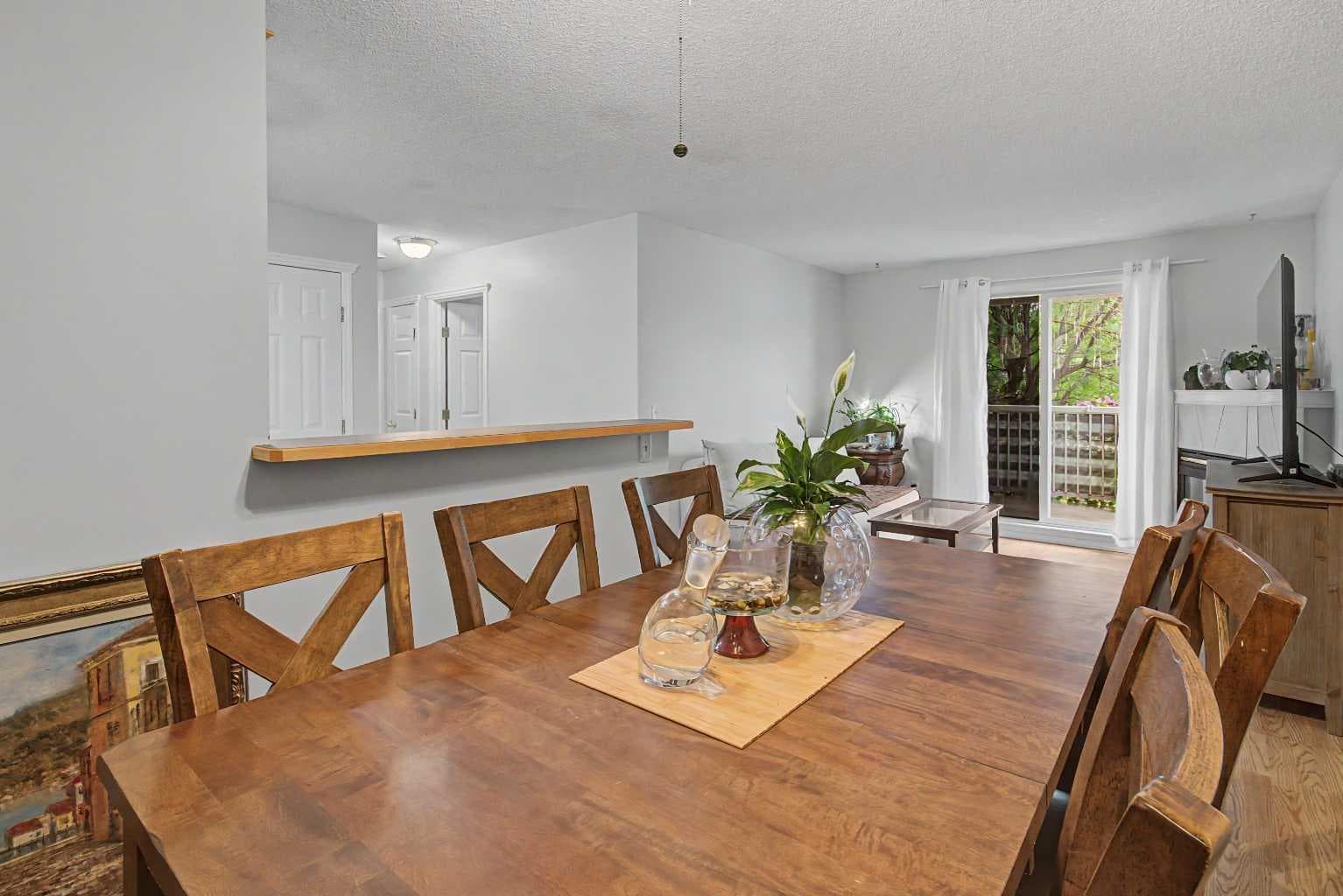 101, 7724 Bowness Road NW
