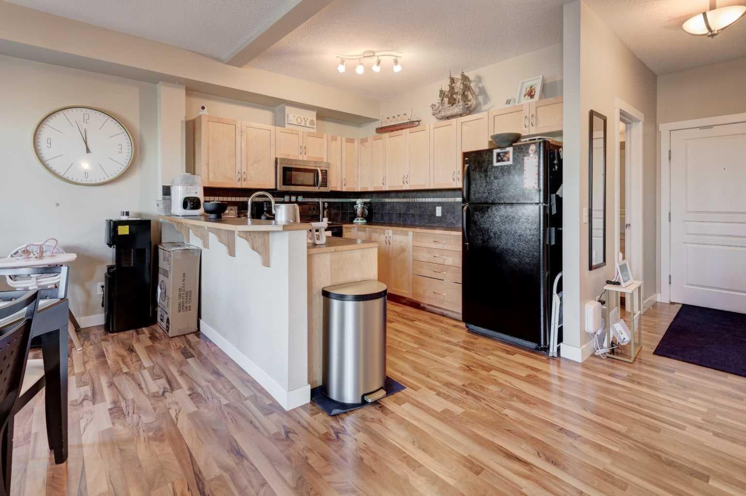 1203, 211 Aspen Stone Boulevard SW
