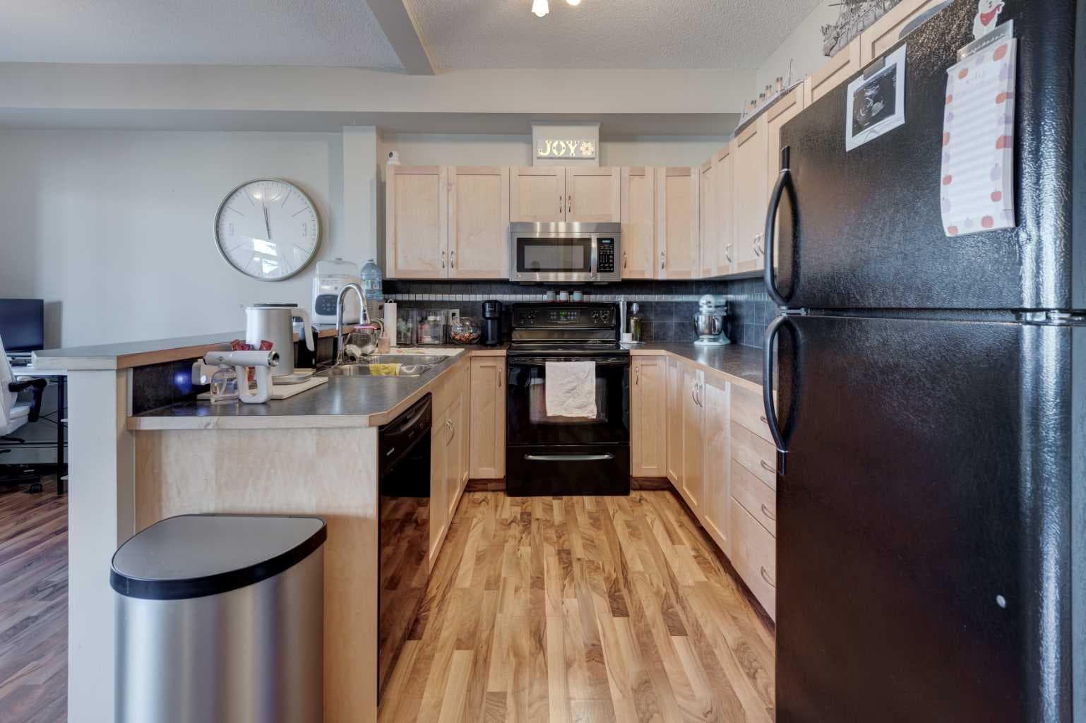 1203, 211 Aspen Stone Boulevard SW