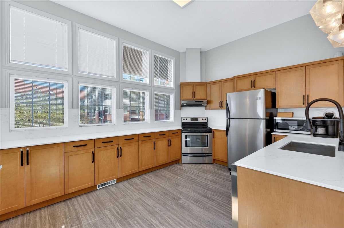 303, 70 Royal Oak Plaza NW