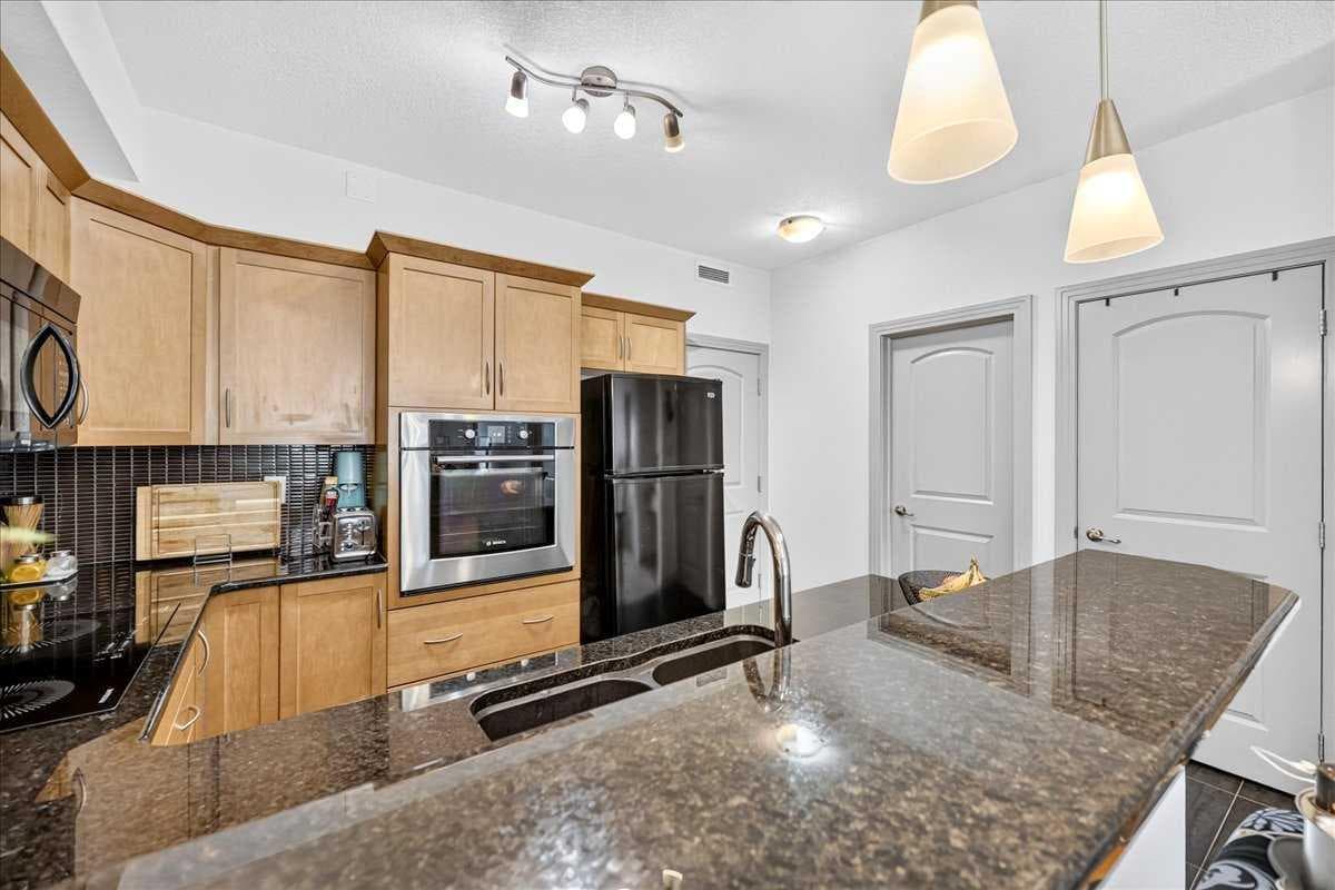 303, 70 Royal Oak Plaza NW