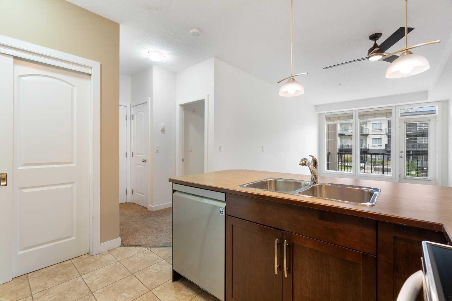 210, 15304 Bannister Road SE