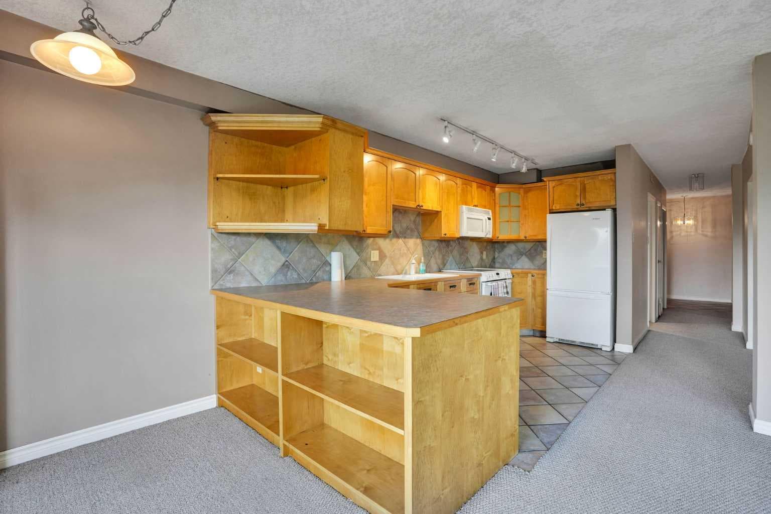 103, 520 Cedar Crescent SW