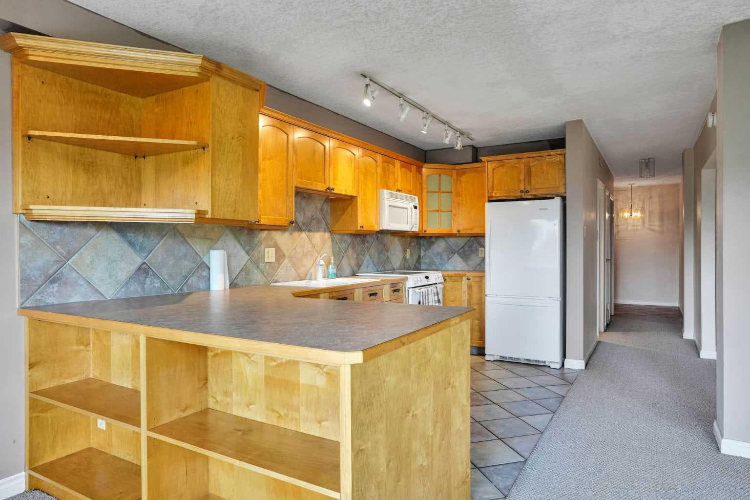 103, 520 Cedar Crescent SW