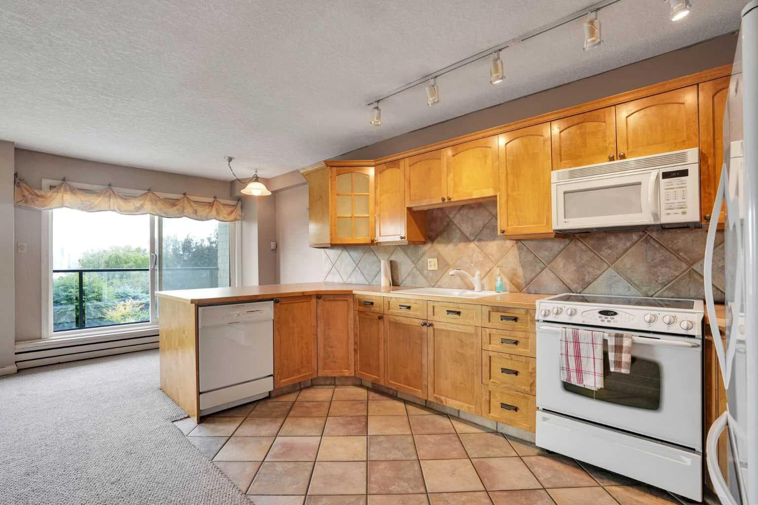 103, 520 Cedar Crescent SW