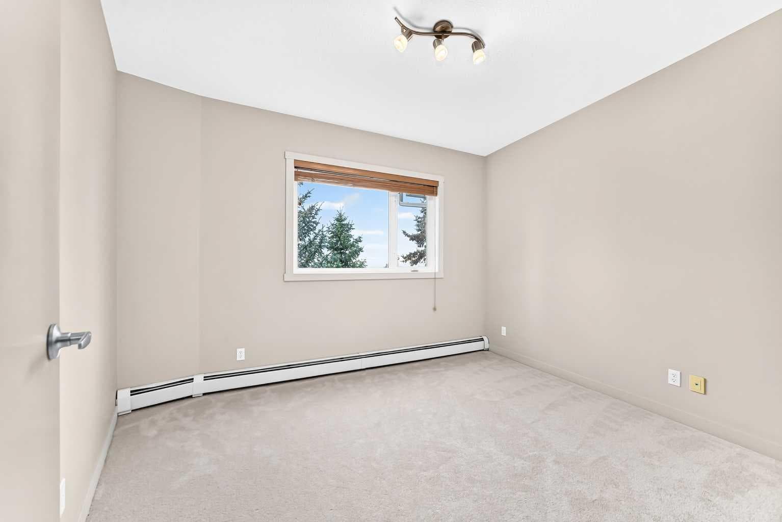306, 69 Springborough Court SW